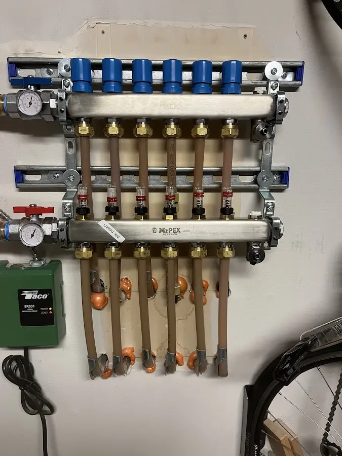 Plumber performing Gas Line Installation at a residential property in Bern